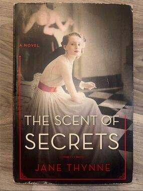 The Scent of Secrets by Jane Thynne - Vintage Novel with Red Accents